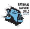 a fist holding the scales of justice